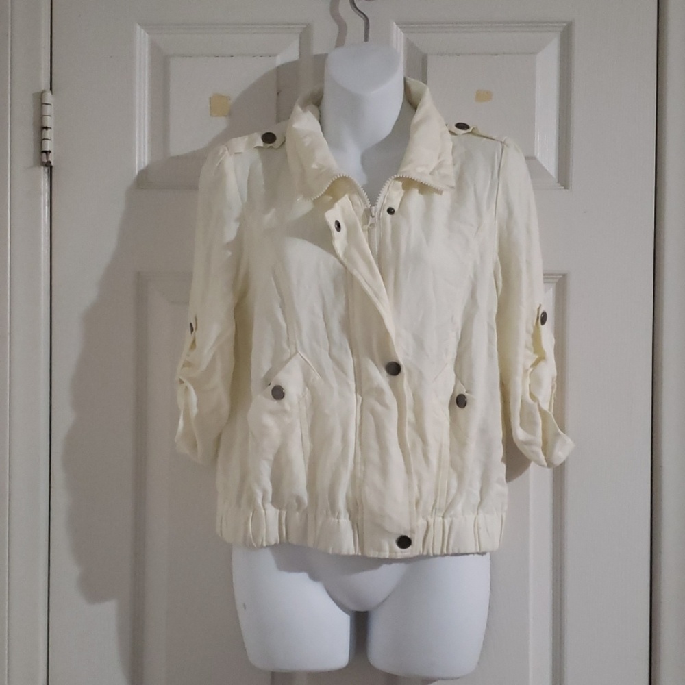 Thin off white jacket.  Size M